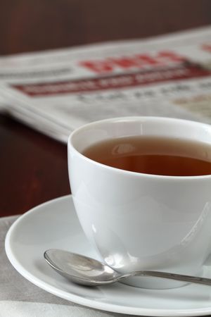 Tea and newspaperの写真素材