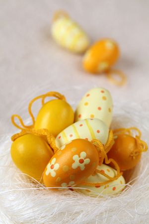 Yellow Easter eggs on white backgroundの写真素材