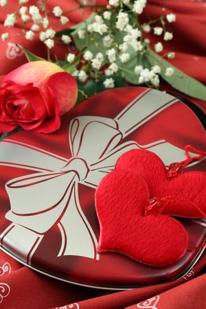 Heart shaped box with heart decoration and roseの写真素材