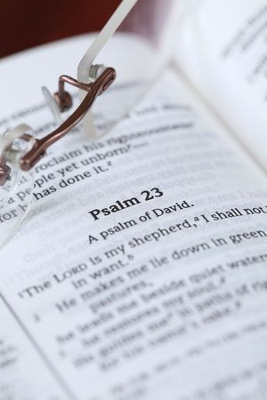 Open Bible with focus on one of the most popular Psalms - Psalm 23. Shallow DOF, selective focus.の写真素材