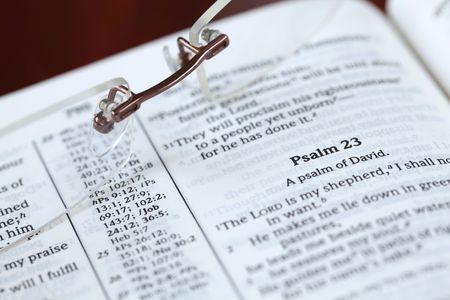 Open Bible with focus on one of the most popular Psalms - Psalm 23. Shallow DOF, selective focus.の写真素材