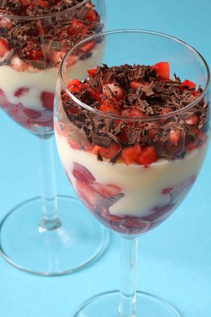 Strawberry and chocolate dessert with vanilla custardの写真素材