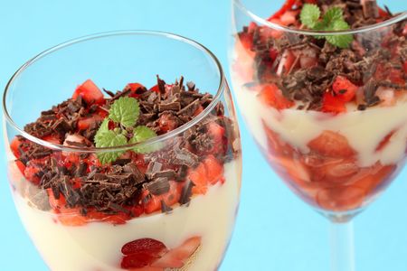 Strawberry and chocolate dessert with vanilla custardの写真素材
