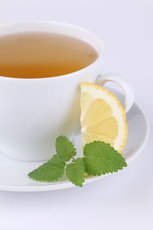 Lemon balm tea with lemonの写真素材