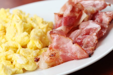 Scrambled eggs and baconの写真素材