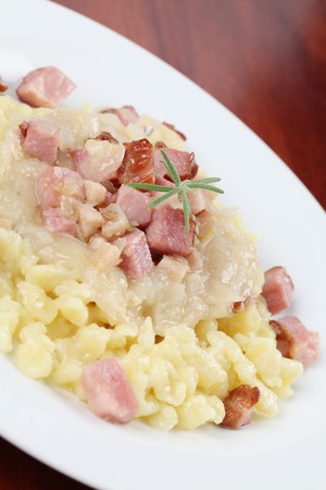 Slovak national food Halushky - potato dumplings with sauerkraut and meatの写真素材