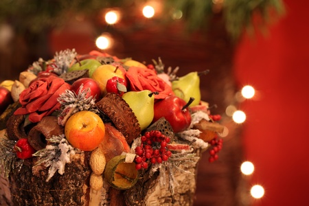 Basket with colorful Christmas decorations with Christmas lights in the background. Shallow dofの写真素材