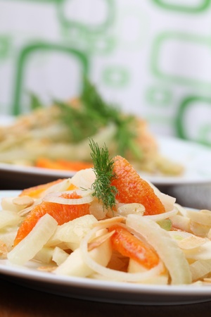 Fennel salad with oranges, almonds, apples, and onion. Shallow dofの写真素材