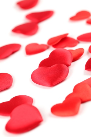 Background made of red heart shaped confetti の写真素材