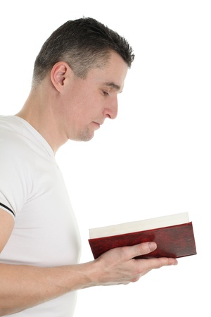 Man reading the Bible isolated on white backgroundの写真素材