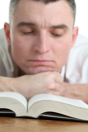 Man studying the Bible  Focus on the Bibleの写真素材