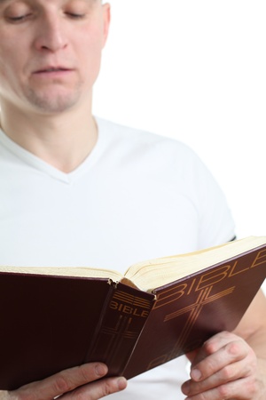 Man reading the Bible  Focus on the Bibleの写真素材