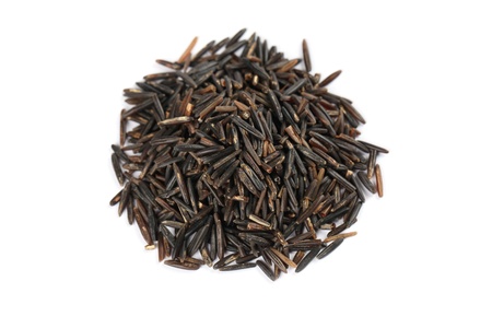 Heap of wild rice on white backgroundの写真素材