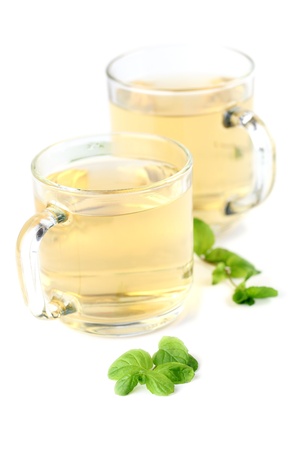Mint leaf and freshly made mint tea in glass cups isolated on white background  Shallow dofの写真素材