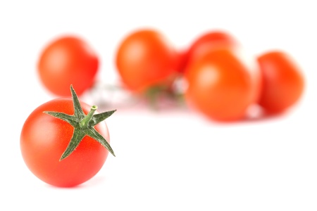 Cherry tomatoes isolated on white background  Shallow dofの写真素材