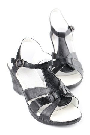 Black leather shoes isolated on white backgroundの写真素材