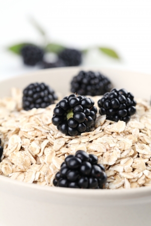 Oatmeal with fresh organic blackberries  Shallow DOFの写真素材