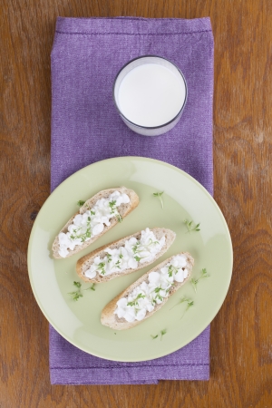 Healthy canapes with cottage cheese and cressの写真素材