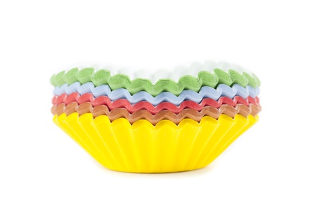 Colorful cupcake liners isolated on white backgroundの写真素材