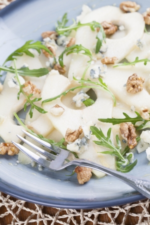 Pear salad with gorgonzola, walnuts, arugula and honeyの写真素材