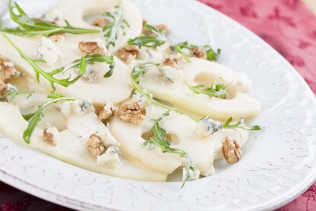 Pear salad with gorgonzola, walnuts, arugula and honeyの写真素材