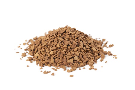 Instant coffee granules isolated on white backgroundの写真素材