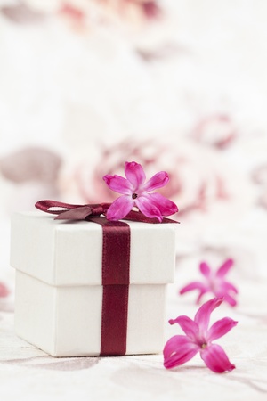 Gift box and little pink hyacinth flowers  Shallow dofの写真素材