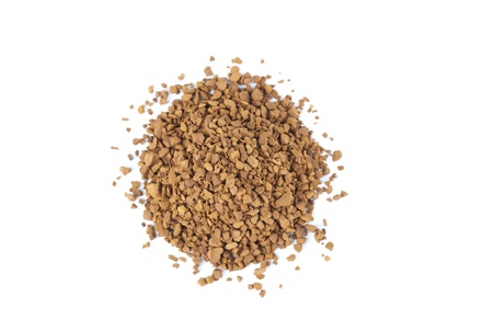 Instant coffee granules isolated on white backgroundの写真素材