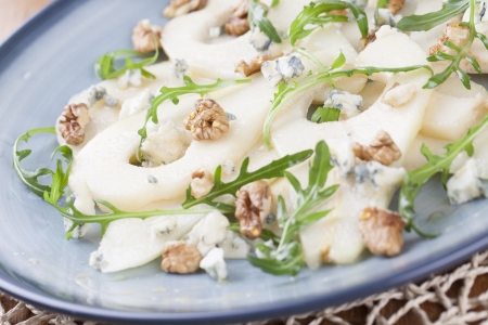 Pear salad with gorgonzola, walnuts, arugula and honeyの写真素材