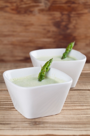 Asparagus cream soup in white bowls  Shallow dofの写真素材