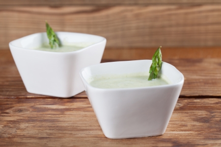 Asparagus cream soup in white bowls  Shallow dofの写真素材