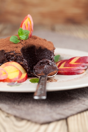 Raw vegan avocado chocolate mousse with nectarineの写真素材