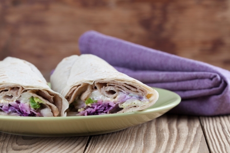 Tortilla wraps with kebab, tzatziki and fresh saladの写真素材