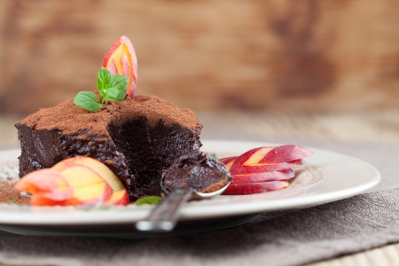 Raw vegan avocado chocolate mousse with nectarineの写真素材