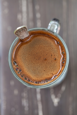Close up of a glass with freshly made coffeeの写真素材