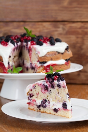 Mulberry and red currant cake with yogurt and whipped creamの写真素材