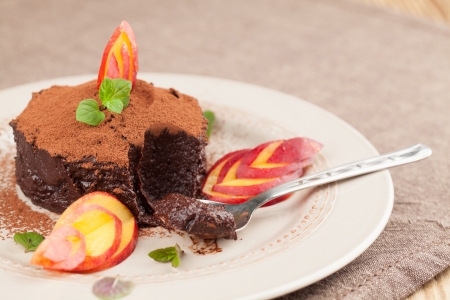 Raw vegan avocado chocolate mousse with nectarineの写真素材