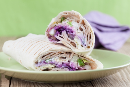 Tortilla wraps with kebab, tzatziki and fresh saladの写真素材