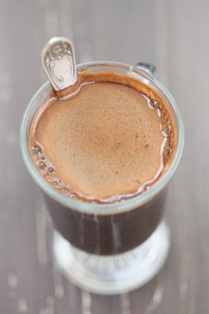 Close up of a glass with freshly made coffeeの写真素材