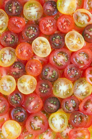 yellow, red and black cherry tomatoesの写真素材
