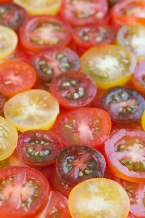 yellow, red and black cherry tomatoesの写真素材