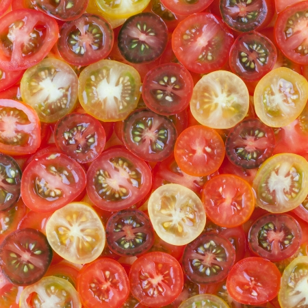 yellow, red and black cherry tomatoesの写真素材