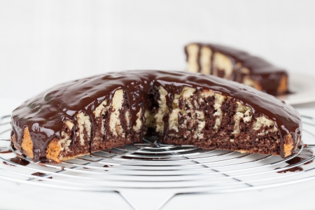 Zebra marble cake with chocolate glaze の写真素材