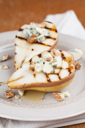 Grilled pear with gorgonzola, walnuts and honeyの写真素材