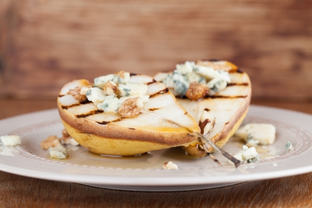 Grilled pear with gorgonzola, walnuts and honeyの写真素材