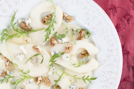 Pear salad with gorgonzola, walnuts, arugula and honeyの写真素材