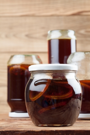 Jars with healthy, freshly made dandelion syrup â alternative medicine for cough, cold or fluの写真素材