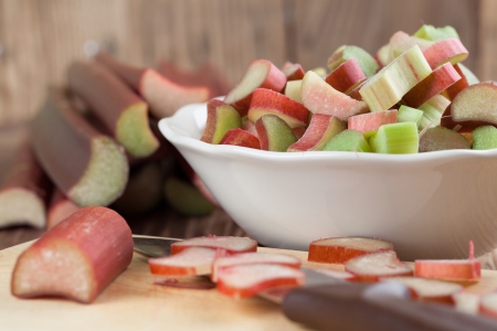 Fresh rhubarb on cutting board. Shallow dofの写真素材