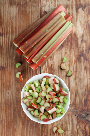 Fresh rhubarb on wooden background  Shallow dofの写真素材