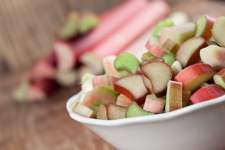Fresh rhubarb on wooden background  Shallow dofの写真素材